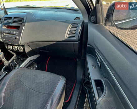 Черный Мицубиси АСХ, объемом двигателя 1.8 л и пробегом 253 тыс. км за 8200 $, фото 81 на Automoto.ua