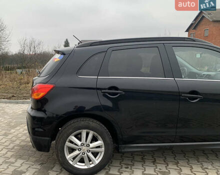 Черный Мицубиси АСХ, объемом двигателя 1.8 л и пробегом 223 тыс. км за 10800 $, фото 9 на Automoto.ua