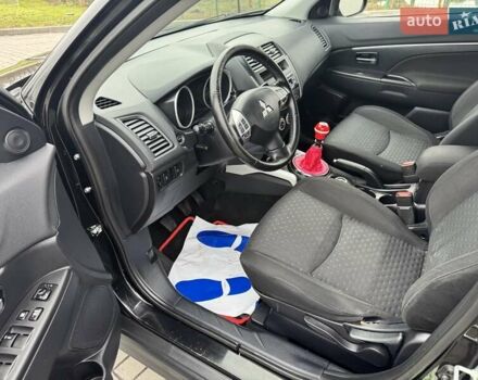 Черный Мицубиси АСХ, объемом двигателя 1.8 л и пробегом 225 тыс. км за 9500 $, фото 11 на Automoto.ua