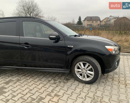 Черный Мицубиси АСХ, объемом двигателя 1.8 л и пробегом 223 тыс. км за 10800 $, фото 10 на Automoto.ua