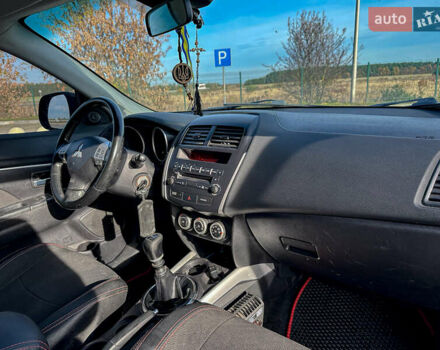 Черный Мицубиси АСХ, объемом двигателя 1.8 л и пробегом 253 тыс. км за 8200 $, фото 85 на Automoto.ua