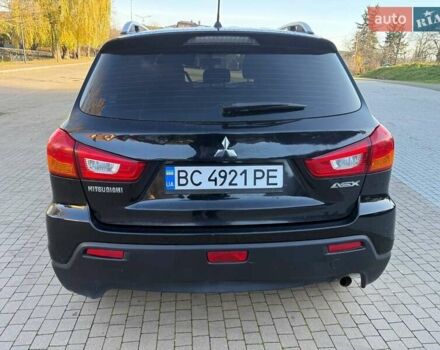 Черный Мицубиси АСХ, объемом двигателя 1.59 л и пробегом 237 тыс. км за 8900 $, фото 6 на Automoto.ua