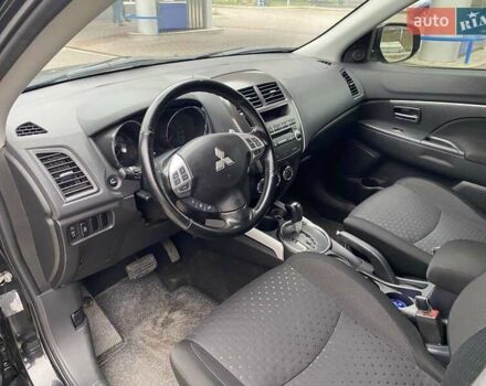 Черный Мицубиси АСХ, объемом двигателя 1.8 л и пробегом 175 тыс. км за 10900 $, фото 23 на Automoto.ua