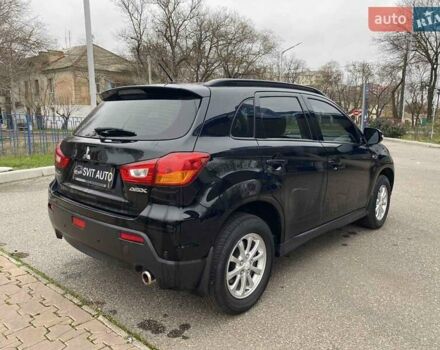 Черный Мицубиси АСХ, объемом двигателя 1.8 л и пробегом 175 тыс. км за 10900 $, фото 10 на Automoto.ua