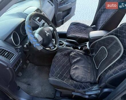 Черный Мицубиси АСХ, объемом двигателя 1.59 л и пробегом 237 тыс. км за 8900 $, фото 25 на Automoto.ua