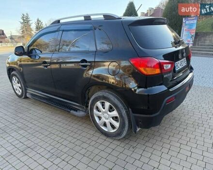 Черный Мицубиси АСХ, объемом двигателя 1.59 л и пробегом 237 тыс. км за 8900 $, фото 4 на Automoto.ua