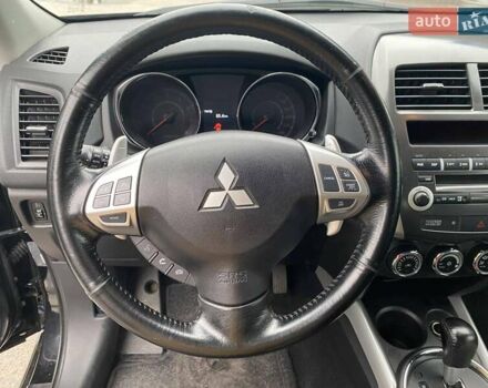 Черный Мицубиси АСХ, объемом двигателя 1.8 л и пробегом 175 тыс. км за 10900 $, фото 35 на Automoto.ua