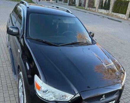 Черный Мицубиси АСХ, объемом двигателя 1.59 л и пробегом 237 тыс. км за 8900 $, фото 2 на Automoto.ua