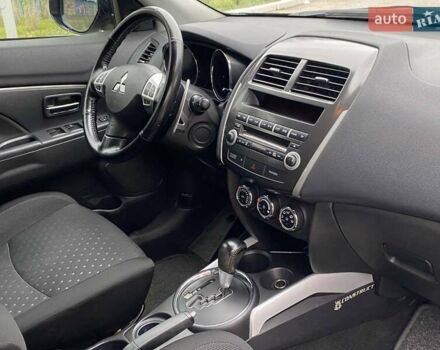 Черный Мицубиси АСХ, объемом двигателя 1.8 л и пробегом 175 тыс. км за 10900 $, фото 30 на Automoto.ua