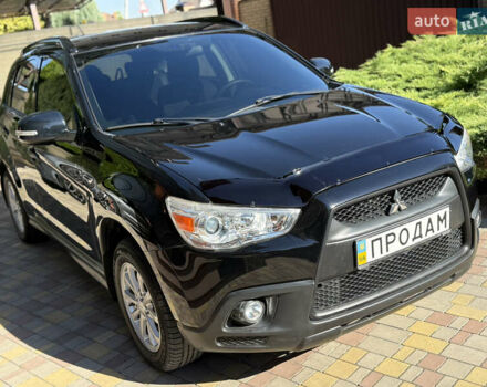 Чорний Міцубісі АСХ, об'ємом двигуна 1.8 л та пробігом 142 тис. км за 10999 $, фото 14 на Automoto.ua