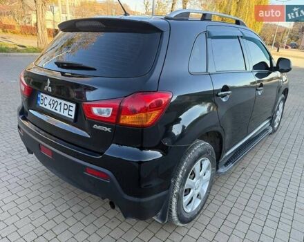 Черный Мицубиси АСХ, объемом двигателя 1.59 л и пробегом 237 тыс. км за 8900 $, фото 9 на Automoto.ua