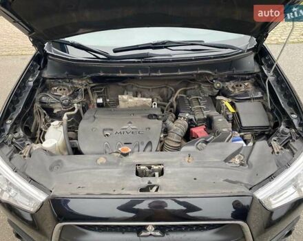 Черный Мицубиси АСХ, объемом двигателя 1.8 л и пробегом 175 тыс. км за 10900 $, фото 49 на Automoto.ua