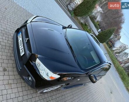 Черный Мицубиси АСХ, объемом двигателя 1.59 л и пробегом 237 тыс. км за 8900 $, фото 1 на Automoto.ua