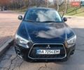 Черный Мицубиси АСХ, объемом двигателя 2 л и пробегом 229 тыс. км за 9500 $, фото 1 на Automoto.ua