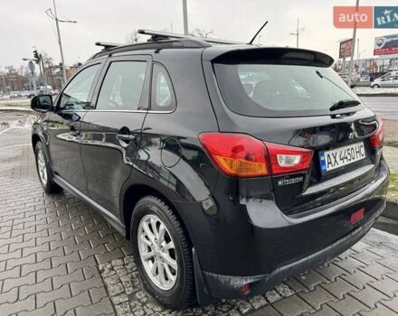 Чорний Міцубісі АСХ, об'ємом двигуна 1.8 л та пробігом 108 тис. км за 11800 $, фото 1 на Automoto.ua