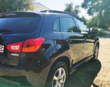 Черный Мицубиси АСХ, объемом двигателя 2.27 л и пробегом 221 тыс. км за 12700 $, фото 3 на Automoto.ua