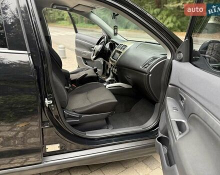 Черный Мицубиси АСХ, объемом двигателя 1.8 л и пробегом 185 тыс. км за 12300 $, фото 67 на Automoto.ua