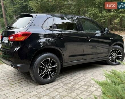 Черный Мицубиси АСХ, объемом двигателя 1.8 л и пробегом 185 тыс. км за 12300 $, фото 19 на Automoto.ua