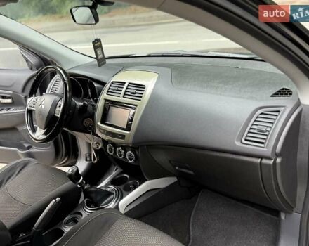 Черный Мицубиси АСХ, объемом двигателя 1.8 л и пробегом 185 тыс. км за 12300 $, фото 61 на Automoto.ua