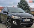 Черный Мицубиси АСХ, объемом двигателя 1.8 л и пробегом 133 тыс. км за 11799 $, фото 1 на Automoto.ua