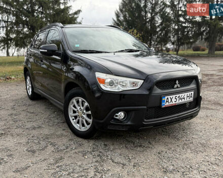 Черный Мицубиси АСХ, объемом двигателя 1.8 л и пробегом 150 тыс. км за 7800 $, фото 1 на Automoto.ua