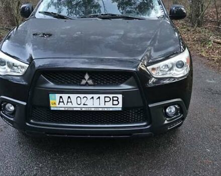 Черный Мицубиси АСХ, объемом двигателя 1.59 л и пробегом 226 тыс. км за 8700 $, фото 1 на Automoto.ua