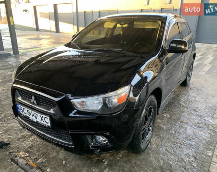 Черный Мицубиси АСХ, объемом двигателя 2 л и пробегом 152 тыс. км за 11700 $, фото 1 на Automoto.ua