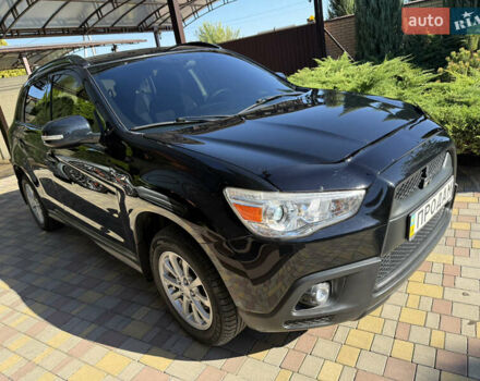 Чорний Міцубісі АСХ, об'ємом двигуна 1.8 л та пробігом 142 тис. км за 10999 $, фото 1 на Automoto.ua