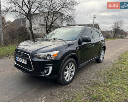 Черный Мицубиси АСХ, объемом двигателя 2 л и пробегом 211 тыс. км за 11000 $, фото 1 на Automoto.ua