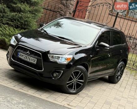 Черный Мицубиси АСХ, объемом двигателя 1.8 л и пробегом 185 тыс. км за 12300 $, фото 1 на Automoto.ua