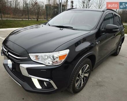 Черный Мицубиси АСХ, объемом двигателя 2 л и пробегом 79 тыс. км за 17900 $, фото 1 на Automoto.ua