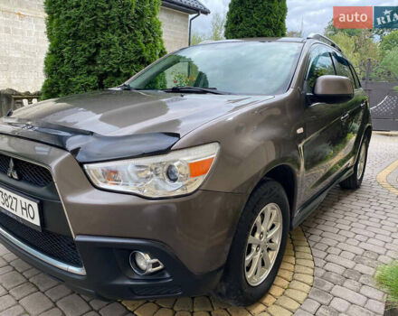 Коричневый Мицубиси АСХ, объемом двигателя 1.8 л и пробегом 327 тыс. км за 8900 $, фото 1 на Automoto.ua