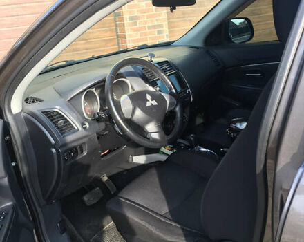 Коричневый Мицубиси АСХ, объемом двигателя 1.8 л и пробегом 112 тыс. км за 9200 $, фото 13 на Automoto.ua