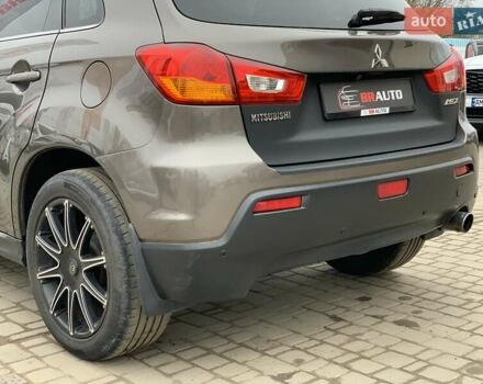 Коричневый Мицубиси АСХ, объемом двигателя 1.8 л и пробегом 202 тыс. км за 11755 $, фото 19 на Automoto.ua