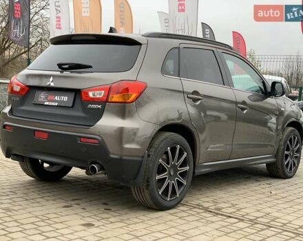 Коричневый Мицубиси АСХ, объемом двигателя 1.8 л и пробегом 202 тыс. км за 11755 $, фото 12 на Automoto.ua