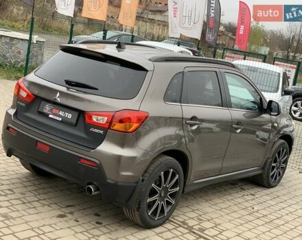 Коричневый Мицубиси АСХ, объемом двигателя 1.8 л и пробегом 202 тыс. км за 11755 $, фото 14 на Automoto.ua