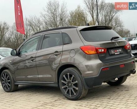 Коричневый Мицубиси АСХ, объемом двигателя 1.8 л и пробегом 202 тыс. км за 11755 $, фото 16 на Automoto.ua