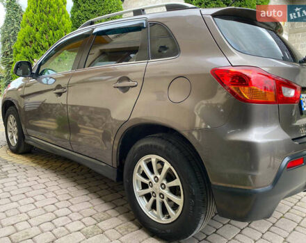 Коричневый Мицубиси АСХ, объемом двигателя 1.8 л и пробегом 327 тыс. км за 8900 $, фото 2 на Automoto.ua