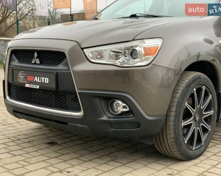 Коричневый Мицубиси АСХ, объемом двигателя 1.8 л и пробегом 202 тыс. км за 11755 $, фото 10 на Automoto.ua