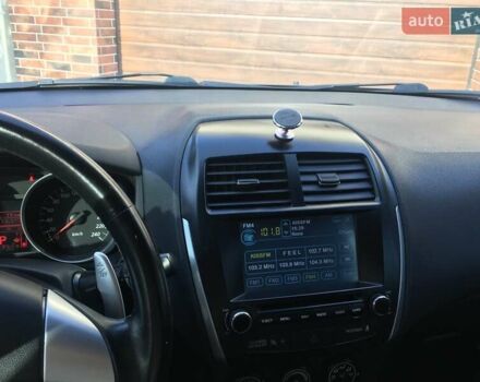 Коричневый Мицубиси АСХ, объемом двигателя 1.8 л и пробегом 112 тыс. км за 9200 $, фото 1 на Automoto.ua