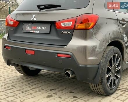 Коричневый Мицубиси АСХ, объемом двигателя 1.8 л и пробегом 202 тыс. км за 11755 $, фото 20 на Automoto.ua