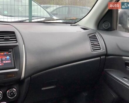 Коричневый Мицубиси АСХ, объемом двигателя 1.8 л и пробегом 202 тыс. км за 11755 $, фото 55 на Automoto.ua