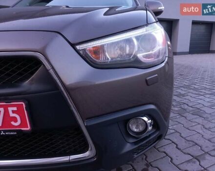 Коричневий Міцубісі АСХ, об'ємом двигуна 1.8 л та пробігом 238 тис. км за 8999 $, фото 17 на Automoto.ua