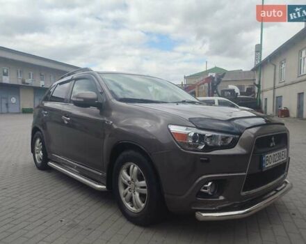 Коричневый Мицубиси АСХ, объемом двигателя 1.8 л и пробегом 300 тыс. км за 10500 $, фото 1 на Automoto.ua