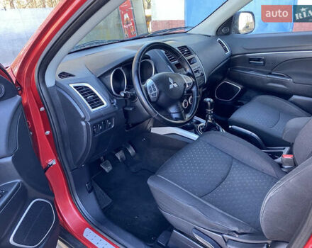 Красный Мицубиси АСХ, объемом двигателя 1.8 л и пробегом 234 тыс. км за 8900 $, фото 17 на Automoto.ua