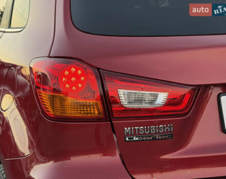 Червоний Міцубісі АСХ, об'ємом двигуна 1.8 л та пробігом 182 тис. км за 10999 $, фото 21 на Automoto.ua