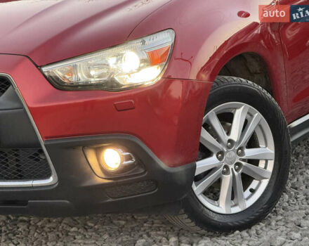 Червоний Міцубісі АСХ, об'ємом двигуна 1.8 л та пробігом 182 тис. км за 10999 $, фото 14 на Automoto.ua