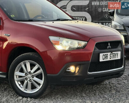 Червоний Міцубісі АСХ, об'ємом двигуна 1.8 л та пробігом 182 тис. км за 10999 $, фото 7 на Automoto.ua