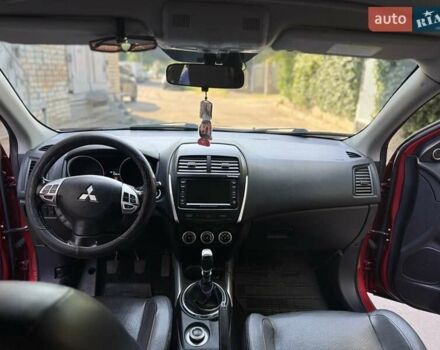Красный Мицубиси АСХ, объемом двигателя 1.8 л и пробегом 210 тыс. км за 11500 $, фото 11 на Automoto.ua