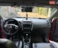Красный Мицубиси АСХ, объемом двигателя 1.8 л и пробегом 210 тыс. км за 11500 $, фото 11 на Automoto.ua